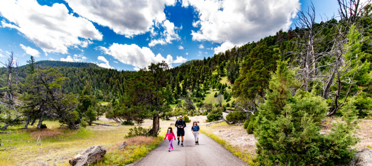 Family hiking in Yellowstone National Park